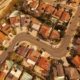 Aerial view of suburban Auckland properties showing shared driveways and housing layouts typical of cross lease titles.