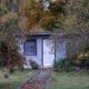 Small detached minor dwelling in a backyard garden on an Auckland residential property